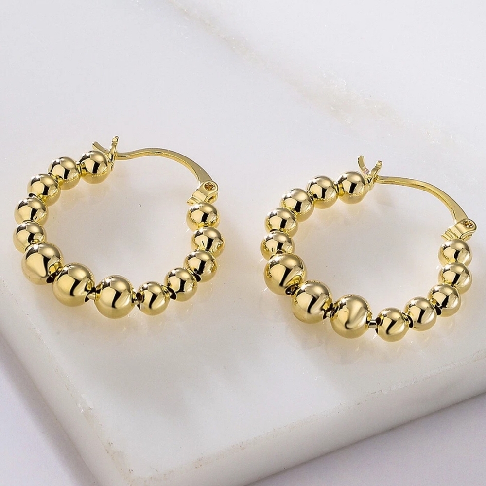 Gold bubble hoop earrings; 1.18"H x 1.1"W; nwot